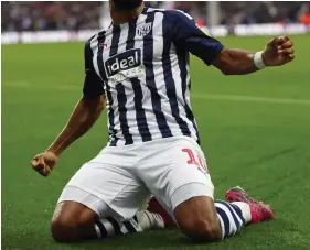  ?? GETTY IMAGES ?? Knees up: Matt Phillips celebrates his first of two goals