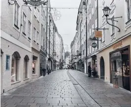  ?? LAETITIA VANCON/THE NEW YORK TIMES ?? The streets of Salzburg were mostly deserted Monday after Austria began its fourth virus lockdown. The lockdown will last at least 10 days.