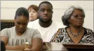  ?? CARA OWSLEY — THE CINCINNATI ENQUIRER VIA AP ?? Audrey DuBose, right, mother of Sam DuBose, looks at the jury as Hamilton County Common Pleas Judge Leslie Ghiz declares a mistrial in the retrial of Ray Tensing Friday in Cincinnati.