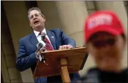  ?? JAKE MAY — THE FLINT JOURNAL VIA AP, FILE ?? Matthew Deperno, Republican candidate for Michigan attorney general, speaks during a rally, Oct. 12, 2021, in Lansing.