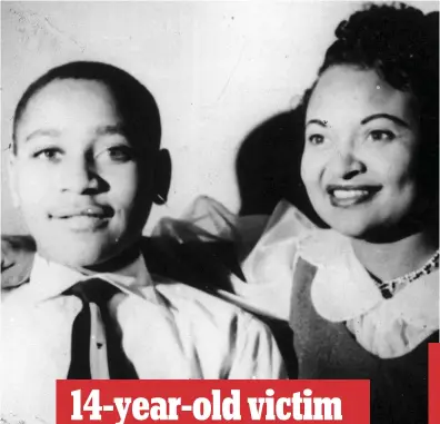  ?? ?? 14-year-old victim
My boy: Emmett Till with his mother Mamie in Chicago, before his trip to Mississipp­i