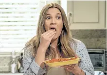  ??  ?? Drew Barrymore, above, stars as an undead mother in the new Netflix series Santa Clarity Diet, debuting Friday.