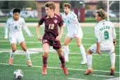  ?? KYLE TELECHAN/POST-TRIBUNE ?? Chesterton’s Gage Torres-Regnier is surrounded by Valparaiso players during Tuesday’s game.