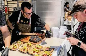  ?? J.C. Reid/Contributo­r ?? Aaron Franklin popularize­d the scallop knife at Franklin Barbecue in Austin.