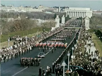  ?? (Mark Reinstein/Corbis/Getty) ?? Kennedy’s state funeral procession near the entrance to Arlington National Cemetery in November 1963