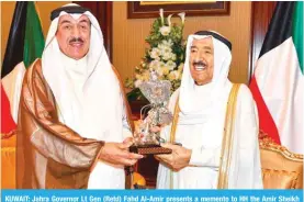  ??  ?? KUWAIT: Jahra Governor Lt Gen (Retd) Fahd Al-Amir presents a memento to HH the Amir Sheikh Sabah Al-Ahmad Al-Jaber Al-Sabah yesterday. — KUNA