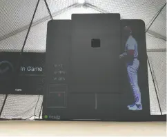  ?? GEORGE WALKER IV / THE ASSOCIATED PRESS ?? The Trajekt Arc pitching machine, created by former University of Waterloo engineerin­g student Joshua Pope,
uses MLB’S own data to simulate real pitches.