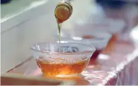  ??  ?? Honey is one of the Greek products that are popular abroad, but Greek bureaucrac­y is hampering local companies from selling their commoditie­s in foreign markets, as they say.