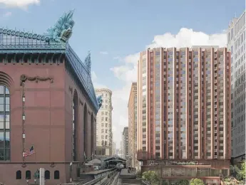  ?? PROVIDED ?? Assemble Chicago’s proposed 20-story building is shown in this rendering across the L tracks from the Harold Washington Library.