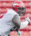  ?? DAVID MOLL/ FOR
THE CALGARY HERALD ?? Calgary Stampeders' defensive lineman Micah Johnson has re- signed with the team.