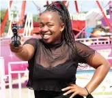  ?? ?? Lesedi Phiri enjoys playing with toy guns.