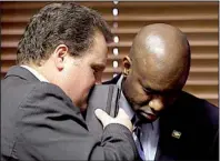  ?? AP/DANNY JOHNSTON ?? State Rep. Nate Bell, R-Mena, (left) speaks with Rep. Fred Love, D-Little Rock, on Monday during a meeting of the Arkansas Legislativ­e Black Caucus. The caucus expressed support for Bell’s legislatio­n, which would end the celebratio­n of Robert E. Lee’s...