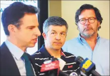  ?? Ned Gerard / Hearst Connecticu­t Media ?? Ian Hockley, center, father of Sandy Hook Elementary School student Dylan Hockley, and Bill Sherlach, right, husband of Sandy Hook school psychologi­st Mary Sherlach, look on as attorney Josh Koskoff speaks at a press conference in Bridgeport in March 2019.