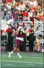  ?? AIMEE BIELOZER — FOR THE MORNING JOURNAL ?? Rocky River’s Mack Massad catches a short punt against Firelands on Aug. 27.