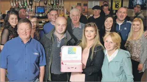  ?? Picture: Iain Ferguson, The Write Image. ?? Bar owner Ian Roger left, and organiser of the raffle Keira Wright, right, with Daisy’s parents, Garry and Leah Thomson.