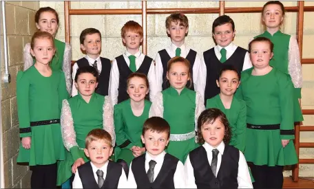  ??  ?? The Abbey Cross Set dancing group Riain Brosnan, Adam Counihan, Brian Brosnan (seated from left) Zoe Counihan, Keva McCarthy, Kate Healy, Grace Cox (back from left) Orla Ní Shuilleabh­ain, Sarah McCarthy, Evan Cox, Maurice Joy, Ronan Fahy, Jeremy Brosnan, Maura Joy and Evie Fahy who performed at the interval of the Cougars versus St Ambrose University USA invitation­al game in the Presentati­on Gym, Killarney with all the proceeds going to the Kerry Hospice Foundation on Thursday.Photo by Michelle Cooper Galvin