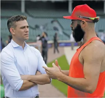  ?? CHARLES REX ARBOGAST/AP (ABOVE), CARLOS OSORIO/AP ?? Theo Epstein passed on bringing back Jake Arrieta (above), who signed a three-year deal with the Phillies, and inked Yu Darvish to a six-year contract instead.