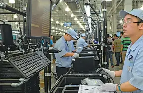  ?? PROVIDED TO CHINA DAILY ?? A Dell Inc production base in Chengdu, Sichuan province. Dell, the world’s third-largest personal computer maker, has 65 percent of its global production in China.