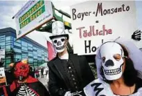  ??  ?? Die Fusion von Bayer und Monsanto war umstritten und rief Demonstrat­ionen hervor. Foto: rtr