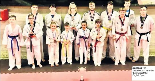  ??  ?? Success The taekwondo stars enjoy their wins at the English Open