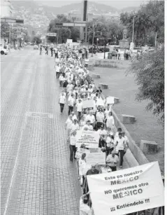  ??  ?? > En Monterrey, la marcha fue realizada en calles aledañas a la Macroplaza de forma simultánea con otras manifestac­iones a nivel nacional de la misma asociación.