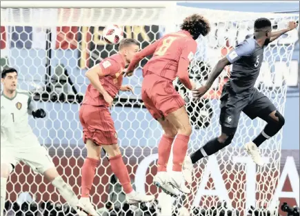  ?? PICTURE: AP ?? A FINALIST RISES: France’s Samuel Umtiti, right, scores the winning goal against Belgium in their World Cup semi-final in St Petersburg last night to secure his country’s third final appearance at the global showpiece. They will face either England or Croatia on Sunday.