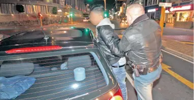  ?? PICTURE: WILLEM LAW ?? BUSTED: The driver of this VW Black Polo allegedly jumped several traffic lights in Sea Point and was arrested for reckless and negligent driving by Ghost Squad officers on Saturday night.