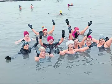  ?? ?? MONTH-LONG CHALLENGE: The hardy swimmers at The Bathie tidal pool, Cellardyke.