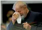  ?? — Reuters ?? Former Brazilian president Luiz Inacio Lula da Silva reacts as he attends a mass to mark one year since his wife’s death in Sao Bernardo do Campo, Brazil.