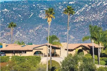  ?? ?? The R.H. Johnson adobe by Weir Brothers Constructi­on, now owned by Peter and Raydene St. Clair, was built from sun-dried mud blocks on a site near Kit Carson Park in Escondido.