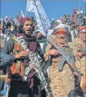  ?? AFP FILE ?? Afghan Taliban celebrate the peace deal in Alingar district of ■
Laghman Province on March 2.