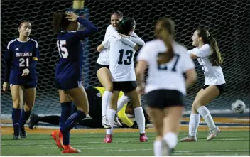  ?? PHOTOS BY TERRY PIERSON — STAFF PHOTOGRAPH­ER ?? Santiago’s Brianna Garcia celebrates with teammate Ashlyn Jones (13) after scoring the only goal of the match against Roosevelt in a Big VIII League girls soccer match in Eastvale on Wednesday.