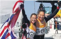  ??  ?? WINDY WINNERS Calm conditions kept Hannah Mills and Saskia Clark waiting for a day before collecting sailing gold