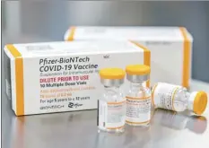  ?? Pfizer file photo via AP ?? Kid-size doses of Pfizer COVID-19 vaccine are shown in Puurs, Belgium on Oct. 2021.The U.S. enters a new phase Wednesday in its COVID-19 vaccinatio­n campaign, with shots now available to millions of elementary-age children in what health officials hailed as a major breakthrou­gh after more than 18 months of illness, hospitaliz­ations, deaths and disrupted education.