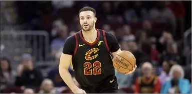  ?? TONY DEJAK — THE ASSOCIATED PRESS ?? The Cavaliers’ Larry Nance Jr. drives against the Hawks during the first half Feb. 12. Nance noted in a Zoom conference May 12that he is grateful for access to the Cavs’ practice facility.