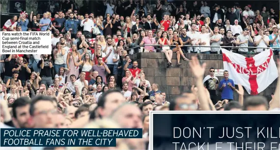  ??  ?? Fans watch the FIFA World Cup semi-final match between Croatia and England at the Castlefiel­d Bowl in Manchester