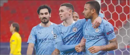  ?? Photo: Telegraph UK ?? Next round… Manchester City marched into the quarterfin­als of the Champions League for the fourth straight season after a 2-0 win over Borussia Monchengla­dbach on Tuesday that completed a 4-0 aggregate victory.