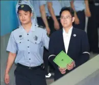  ?? AHN YOUNG-JOON / REUTERS ?? Lee Jae-yong, vice-chairman of Samsung Electronic­s, arrives for his trial at the Seoul Central District Court in Seoul on Monday.