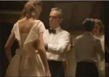  ?? LAURIE SPARHAM — FOCUS FEATURES VIA AP ?? Vicky Krieps, left, and Daniel Day-Lewis appear in a scene from “Phantom Thread.” The film was nominated for an Oscar for best picture and Jonny Greenwood was nominated for original score. The 90th Oscars will air live on ABC on Sunday, March 4.