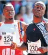  ??  ?? SPRINTING TALENT: Akani Simbine, right, and Lebakeng Sesele after the 200m semifinal