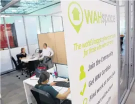  ?? AMY BETH BENNETT/STAFF PHOTOGRAPH­ER ?? WAHspace, which stands for the Work-at-Home space, launched 18 months ago as part of Florida Atlantic University’s Tech Runway accelerato­r program in Boca Raton.