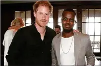  ?? ?? Making tracks: George Mpanga, the artist known as George the Poet, with Prince Harry. Below, Jay-Z, Beyoncé and Kendrick Lamar