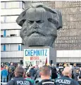  ??  ?? A protest by the Right-wing Pro Chemnitz group at the Karl Marx statue this week