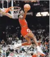  ?? The Associated Press file ?? Michael Jordan soared in Chicago Stadium, winning the 1988 slam-dunk competitio­n over Dominique Wilkins.