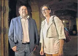  ?? KIM MANRESA ?? Junqueras y Rovira tras el acuerdo alcanzado con Mas