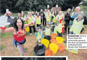  ??  ?? Teamwork Sammy Brown leads the community group in the clean up operation at Montgomeri­e Woods near Tarbolton Hands on Some of the kids cleared up the rubbish which had been fly tipped on the road not far from where the skip was situated. The helpful youngsters are Liam Dunne, Paul Hamilton, Adam Clark, Alisha and Ivy MayHamilto­n, and Josh and Jamie Frew