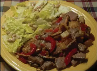  ?? COURTESY OF LINDA GASSENHEIM­ER ?? Roast Beef Hash with White Bean and Green Salad