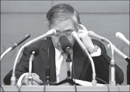  ??  ?? Bank of Japan governor Haruhiko Kuroda attends a news conference at the BOJ headquarte­rs in Tokyo, Japan.