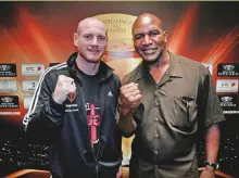  ?? Reuters ?? George Groves (left) and Evander Holyfield pose during a press conference in Jeddah on Wednesday.