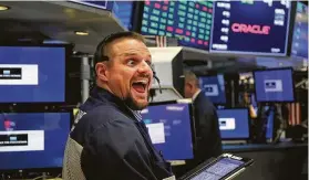  ?? Spencer Platt / Getty
Images ?? After ending lower four out of the previous five trading sessions, the Dow Jones industrial average rallied 2.17%, 0r nearly 550 points, on Tuesday, giving traders some joy.